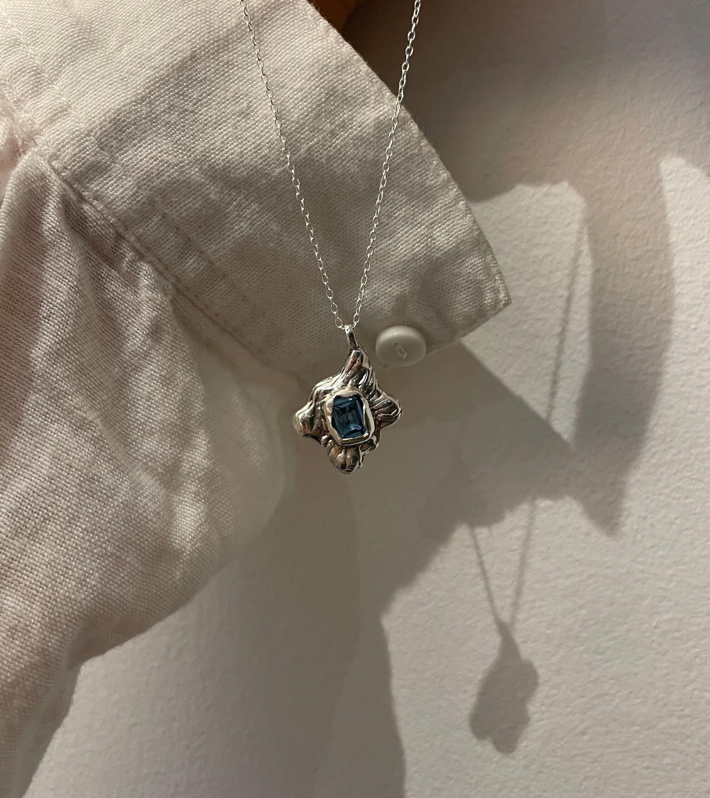 Ocean-Inspired Silver Necklace – Blue Topaz Handmade Jewellery | Organic Textured Pendant